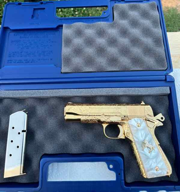 Hand engraved Colt 1911 commander 45acp