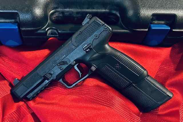 LNIB FN 5.7 Pistol  30rd mag 500rds. ammo 