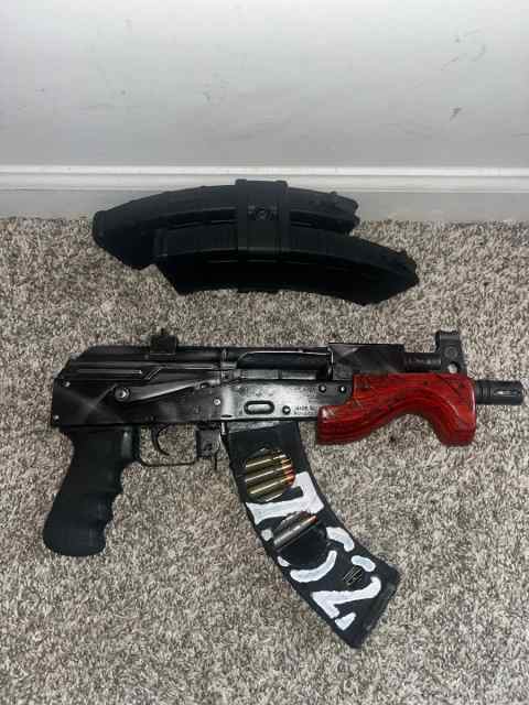 2 Glocks , micro Draco , mp5 fs